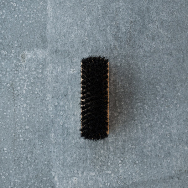 Redecker shoe shine brush made from beautifully handcrafted beechwood and horse hair for effective cleaning and polishing. Available in neutral or black horse hair. 