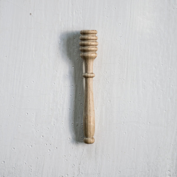 Dribbling honey over your favourite crumpets, toast or ready to bake tart is a pleasure with a timber honey dribbler, this one by Redecker. Twirl the dribbler in your honey jar to hold honey in the timber grooves, and hold still above your toast to release. 