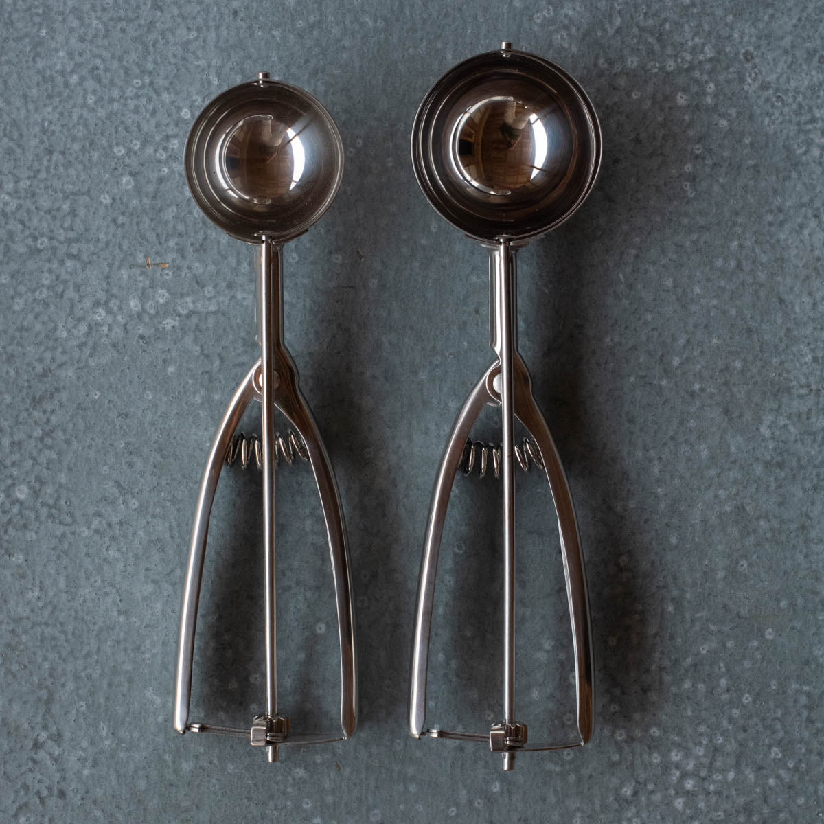 https://www.exchangestores.com.au/cdn/shop/products/StainlessSteelIceCreamScoops.jpg?v=1574904576