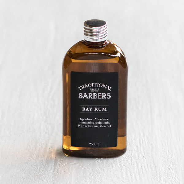 The scent of Traditional Barbers Bay Rum, in a 250ml brown plastic bottle, evokes memories of visits to the barber and gentlemen's grooming essentials. It is a refreshing, splash-on, aftershave lotion and a stimulating scalp tonic, containing menthol to give an invigorating feel to the skin.