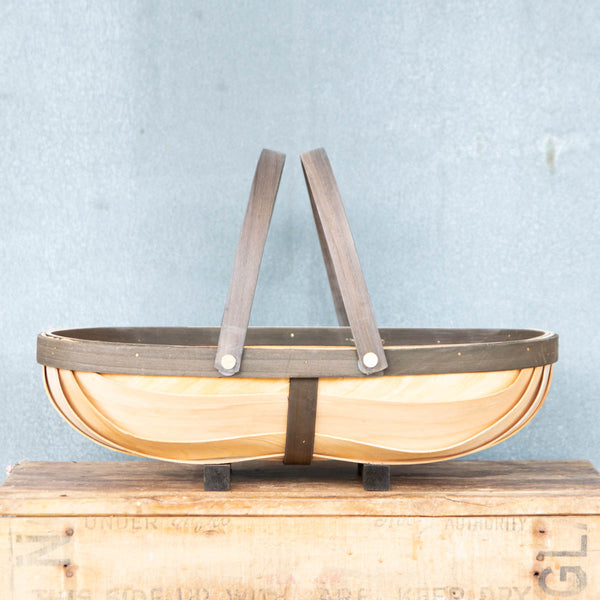 A timber trug for picking flowers or light greens and vegetables from the garden, or foraging in the paddock or forest. Made from FSC cypress pine with two handles that pivot on brass pins to stand upright or fold flat for easy access or storage.
