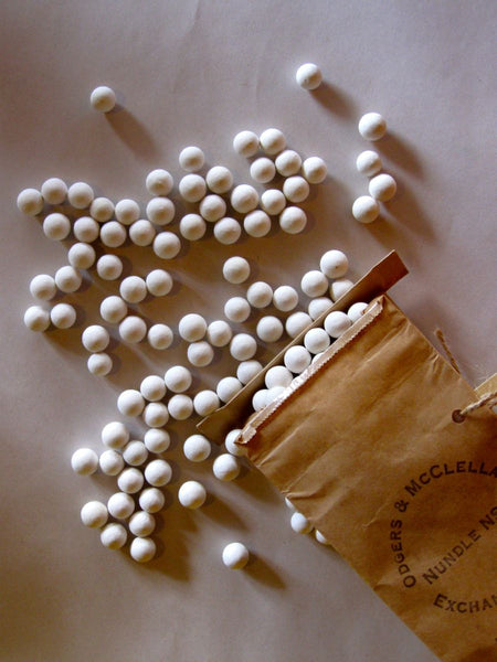 Use ceramic pie weights when blind baking to prevent your pastry from shrinking, bubbling or rising before spreading filling across a golden pie base.