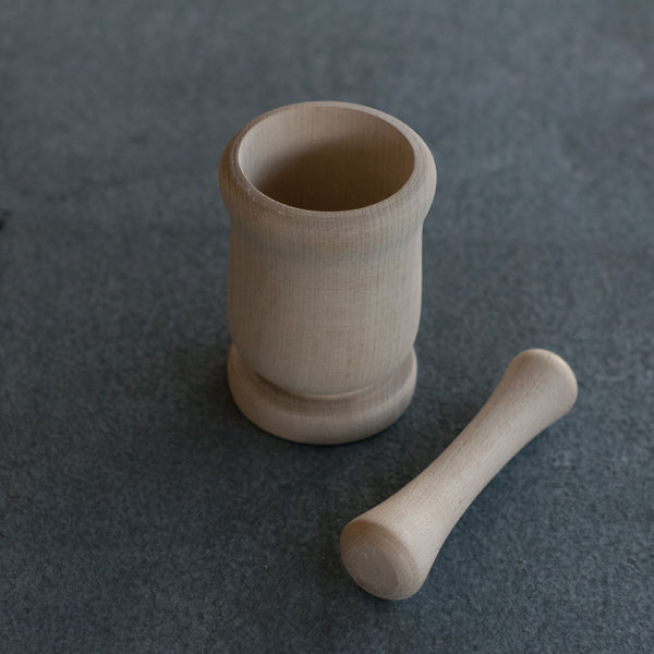 Enjoy the simplicity of this beech timber mortar and pestle for grinding spices and making cooking pastes. The mortar and pestle has the advantage of having a small footprint and is remarkably light. Hand wash with soap and water. Unfinished wood will patina with use.