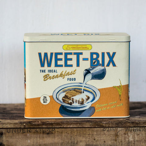 Weet-Bix tin for convenient storage, featuring an original retro Sanitarium design, to protect your cereal from ants and other kitchen pests. Hinged lid.